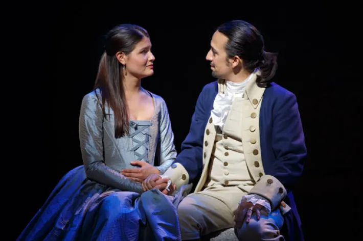 Philippa Soo and Lin-Manuel Miranda as Elizabeth and Alexander Hamilton on the Broadway stage.