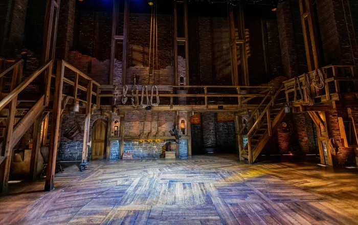 The stage for Hamilton with stage lighting but empty