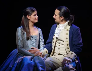 Philippa Soo and Lin-Manuel Miranda as Elizabeth and Alexander Hamilton on the Broadway stage.